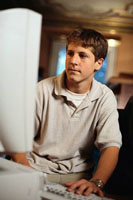 Boy sitting at a computer