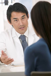Doctor speaking with a patient