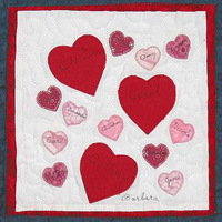 photo of a WHI quilt made with hearts.